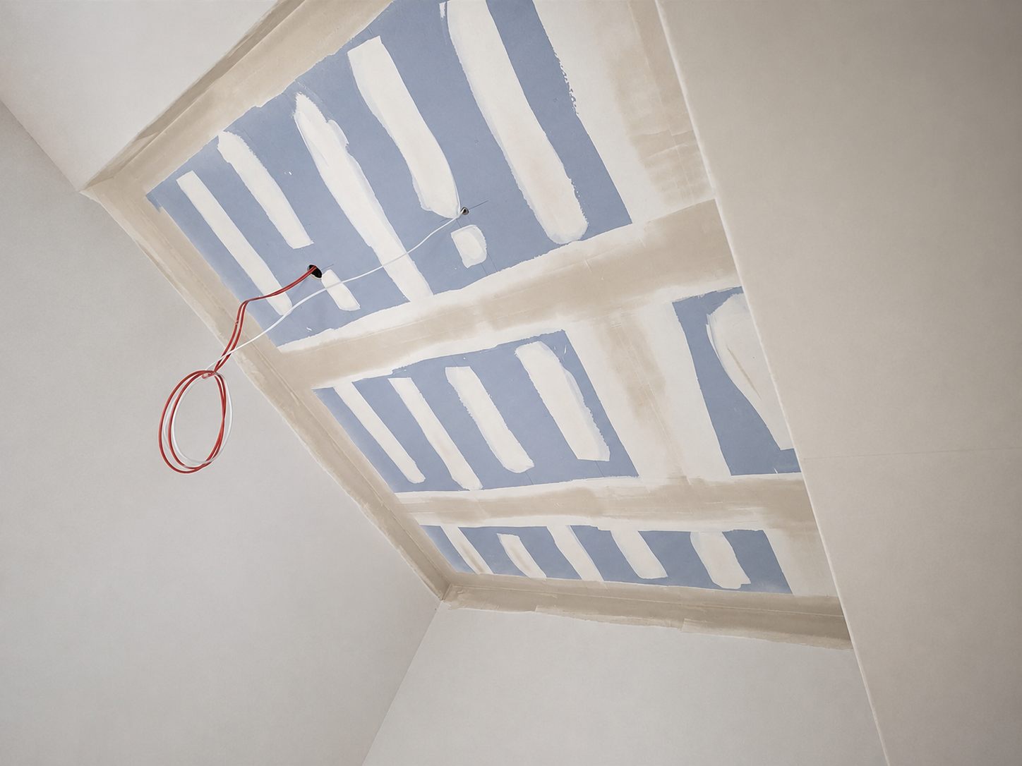Ceiling bulkhead with board joints filled ready for sanding